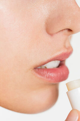 women applying lipcare